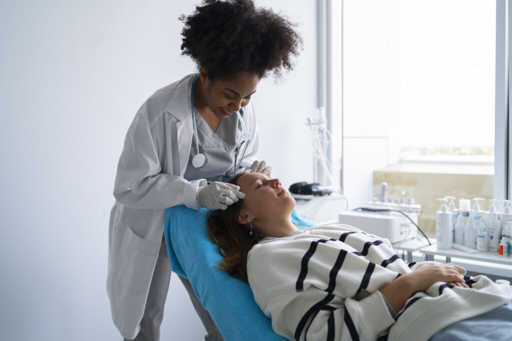 Dermatologist in Nassau providing comprehensive medical dermatology consultation.