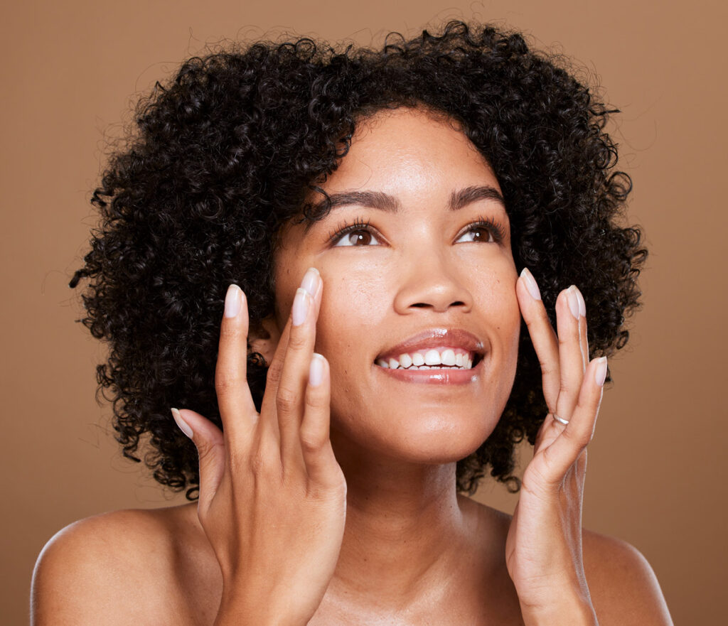 Radiant glowing skin after professional facial treatment at Clare Dermatology Nassau Bahamas